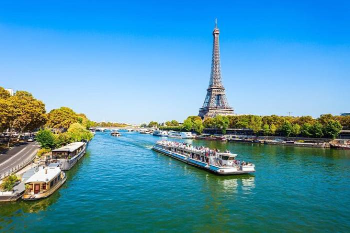 Eiffel Tower & Seine Duo: Summit Access with Champagne & Seine River Cruise